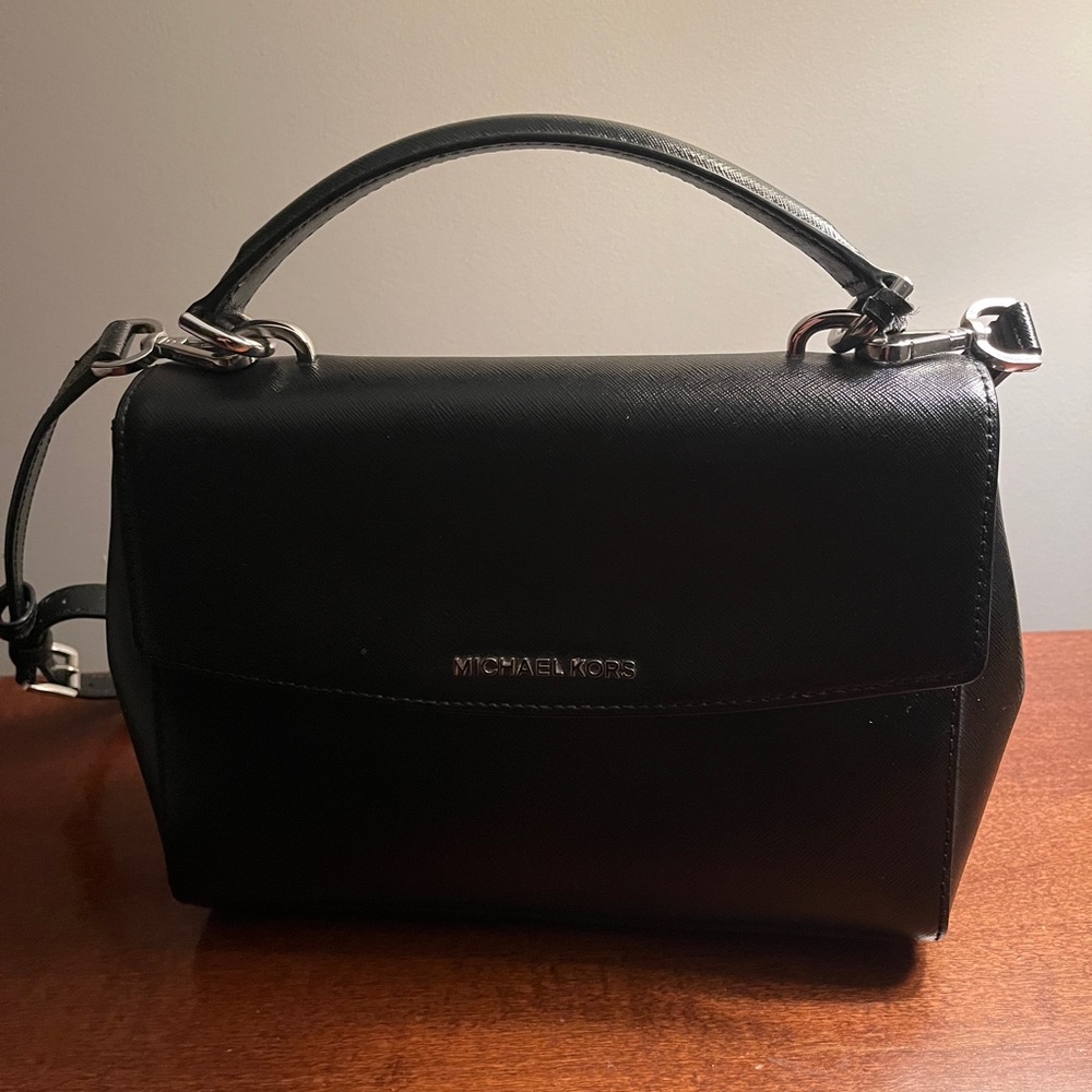 Michael Kors black clutch handbag with removable shoulder strap
